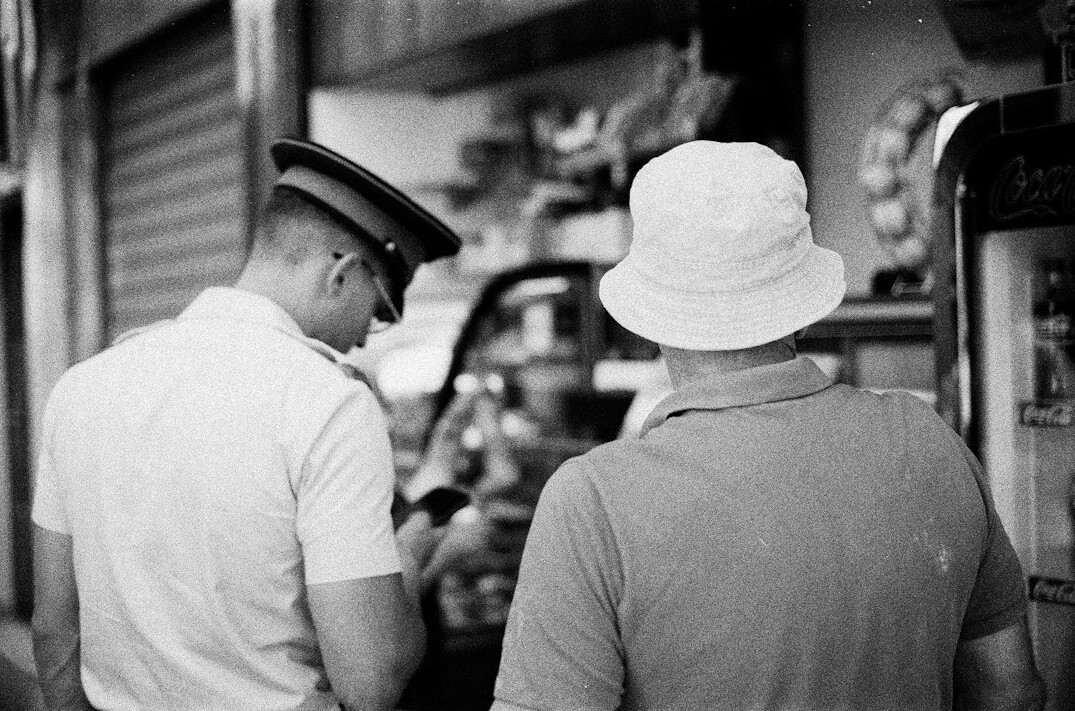 store security guard watching customers
